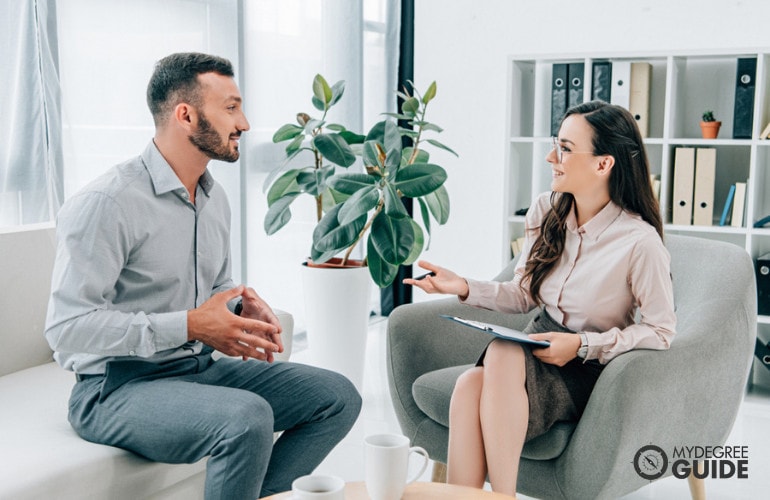 Psychologist with a client during consultation